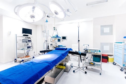 Operating room with table and equipment. Operating room with table and equipment.
