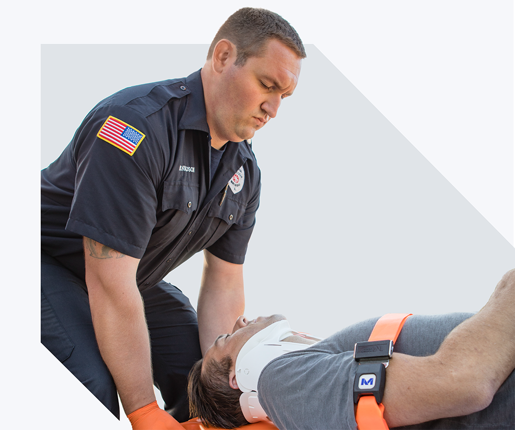OTH_EMS_Web_Banner EMS personell assisting a patient with a neck brace