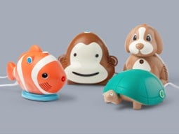 Nebulizers shaped like a clown fish, monkey, turtle and puppy Blue and grey illustration of purchase order with dollar sign and invoice with equal sign and dollar sign