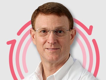 Gregory-Schult Headshot of Dr. Gregory Schultz with three pink concentric circles in the background