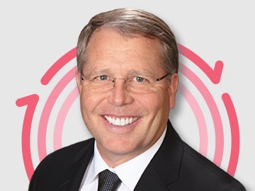 Randall-Wolcott Headshot of Dr. Randall Wolcott with three pink concentric circles in the background